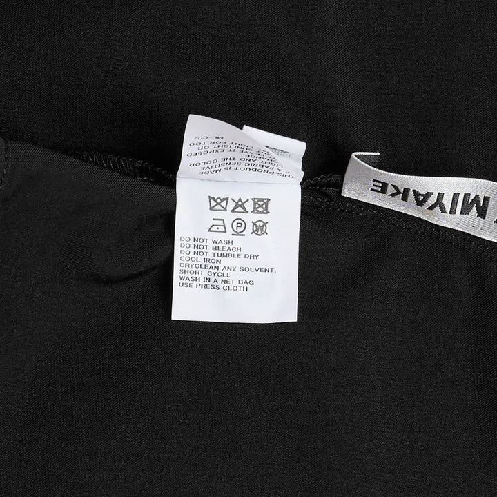 ISSEY MIYAKE Twisted Drape Woven Pants – Available at Club 21, Official Retailer in Singapore, Malaysia & Thailand with Global Shipping Online
