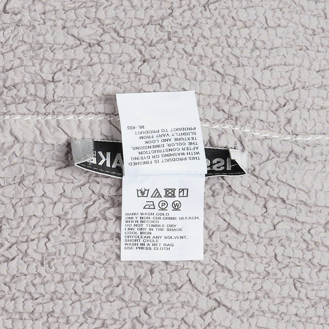 ISSEY MIYAKE Wavelet Ensemble Woven Top – Available at Club 21, Official Retailer in Singapore, Malaysia & Thailand with Global Shipping Online