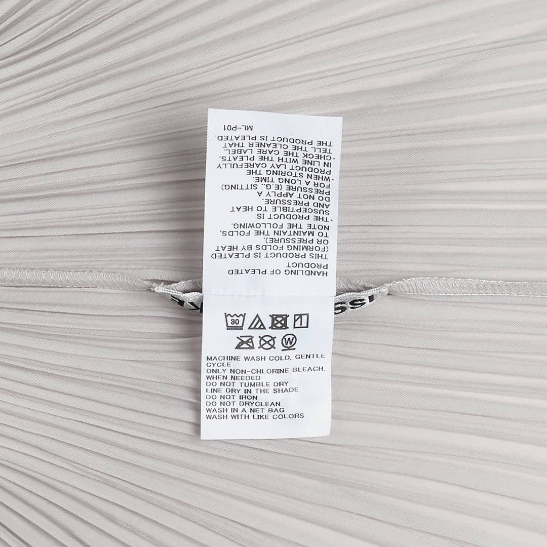 ISSEY MIYAKE Box Shoulder Pleated Top – Available at Club 21, Official Retailer in Singapore, Malaysia & Thailand with Global Shipping Online