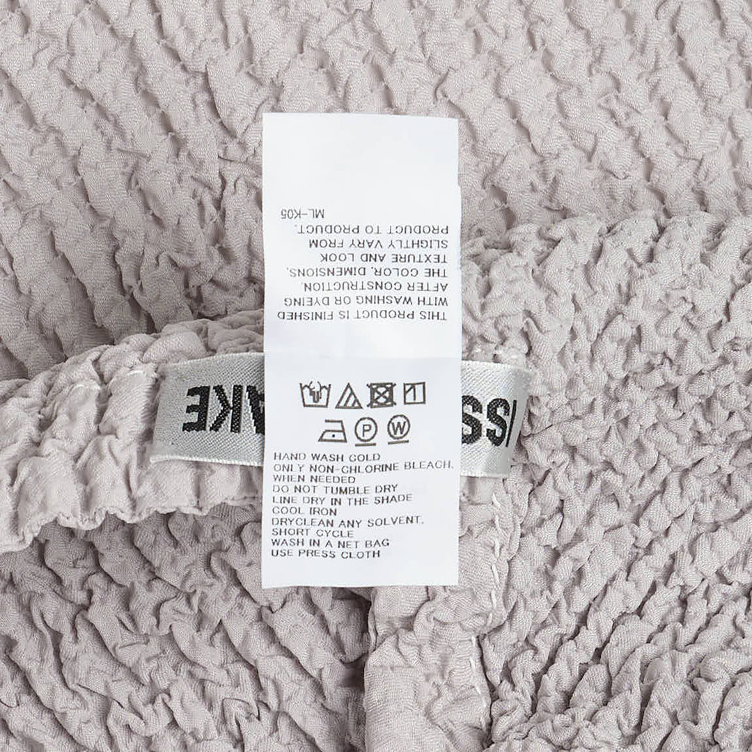ISSEY MIYAKE Wavelet Ensemble Cardigan – Available at Club 21, Official Retailer in Singapore, Malaysia & Thailand with Global Shipping Online