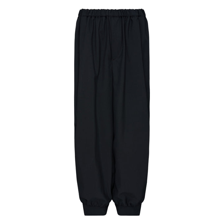 Comme des Garçons Black cuffed hem elastic waistband pants in black with wide-leg silhouette and elasticated ankles