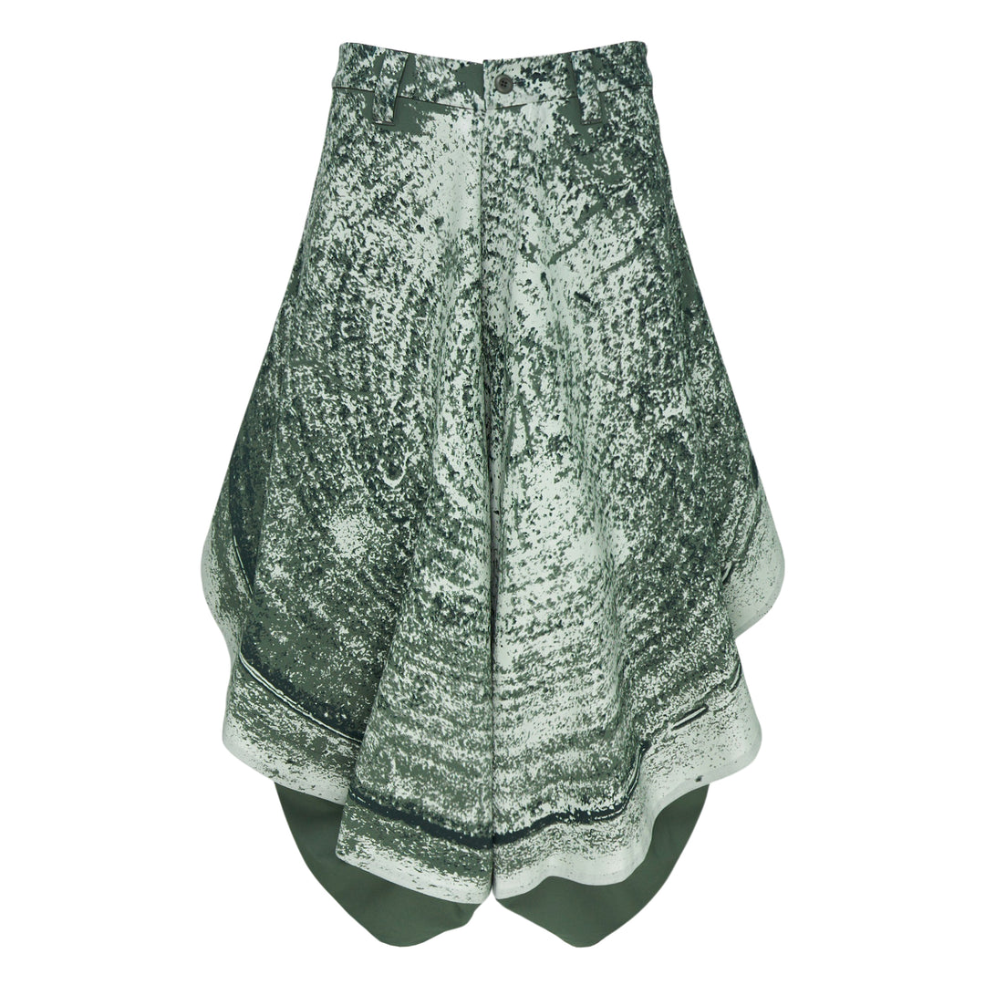 IM MEN Marble Print Wide Woven Pants in sage green and white, featuring a dramatic flared layered silhouette with scalloped tiered hem panels, front view on white background