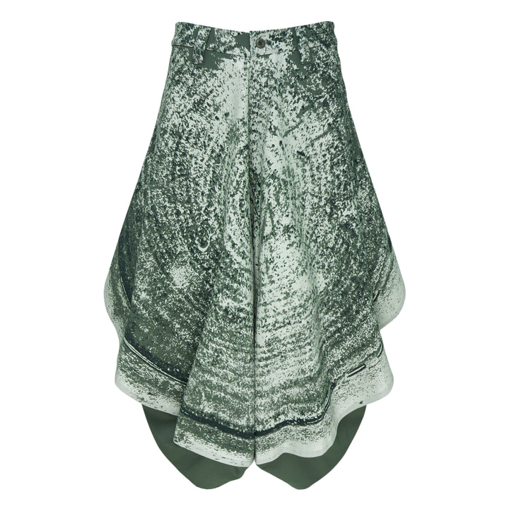 IM MEN Marble Print Wide Woven Pants in sage green and white, featuring a dramatic flared layered silhouette with scalloped tiered hem panels, front view on white background