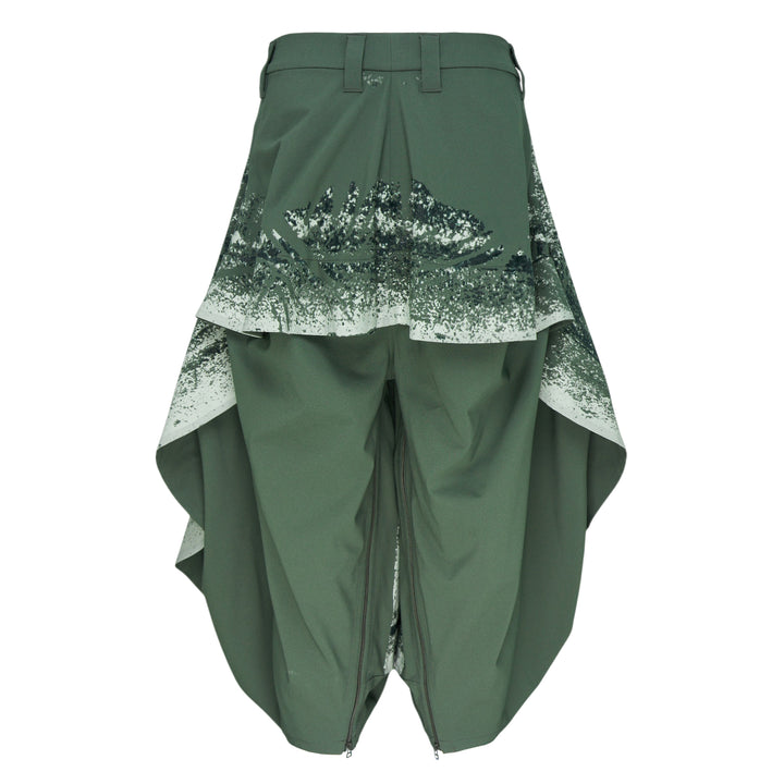 IM MEN Marble Print Wide Woven Pants in sage green and white, featuring a dramatic flared layered silhouette with scalloped tiered hem panels, front view on white background