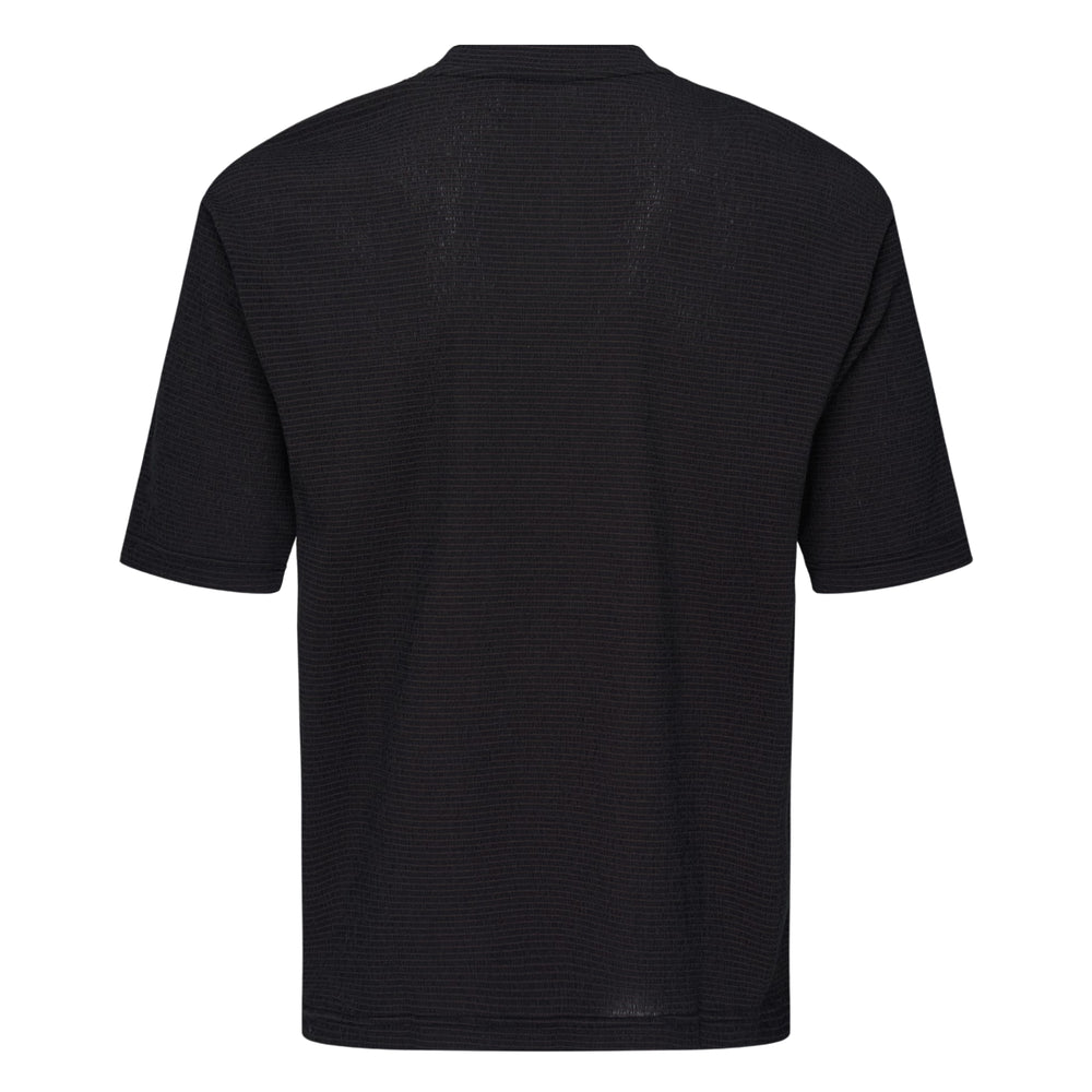 IM MEN Shrink Stretch T in sky blue — oversized crew-neck short sleeve tee with fine grid-textured stretch fabric, front view on white background