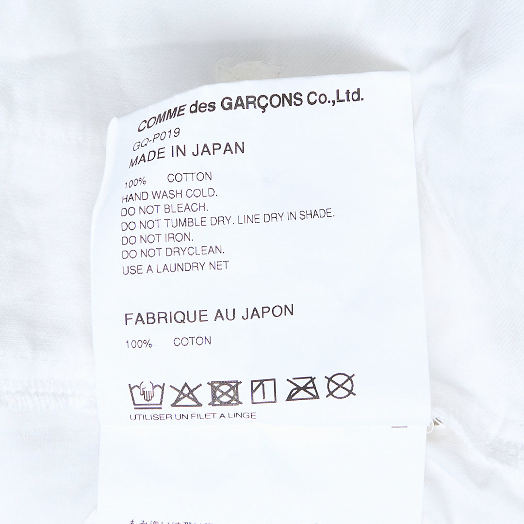COMME des GARCONS Cotton Poplin Pigment Print Pants – Available at Club 21, Official Retailer in Singapore, Malaysia & Thailand with Global Shipping Online