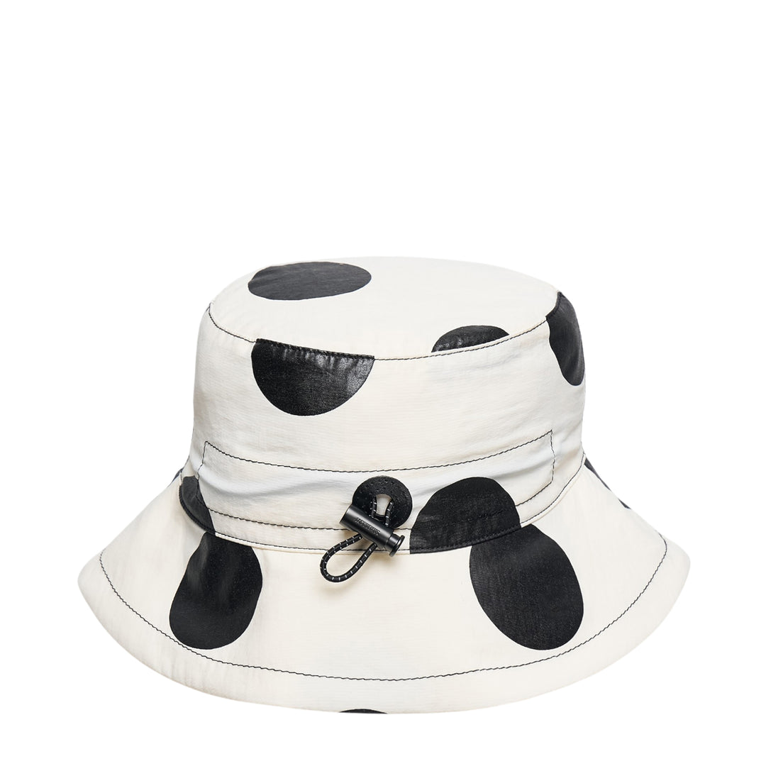 Jacquemus Le Bob Baluchon bucket hat in off-white with large black polka dots, featuring a wide brim with contrast topstitching and script logo detail - view 3