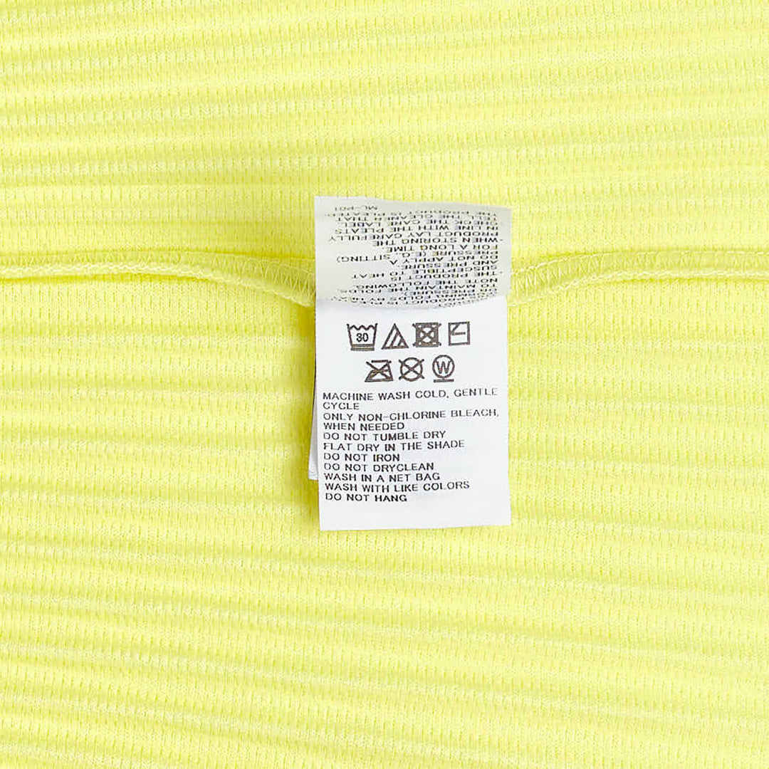 Homme Plissé Issey Miyake Monthly Colors May black accordion pleated wide-leg cropped pants with elastic waistband, front view on white background