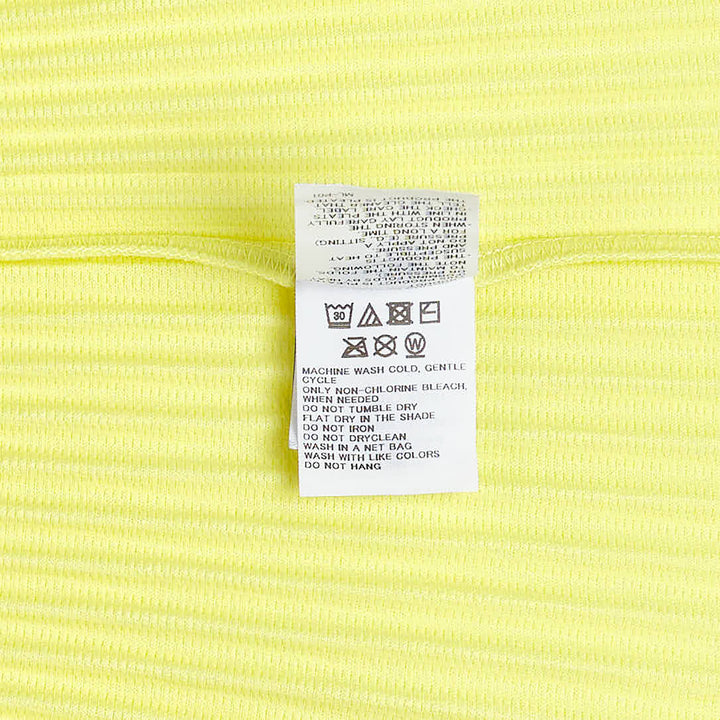 Homme Plissé Issey Miyake Monthly Colors May black accordion pleated wide-leg cropped pants with elastic waistband, front view on white background