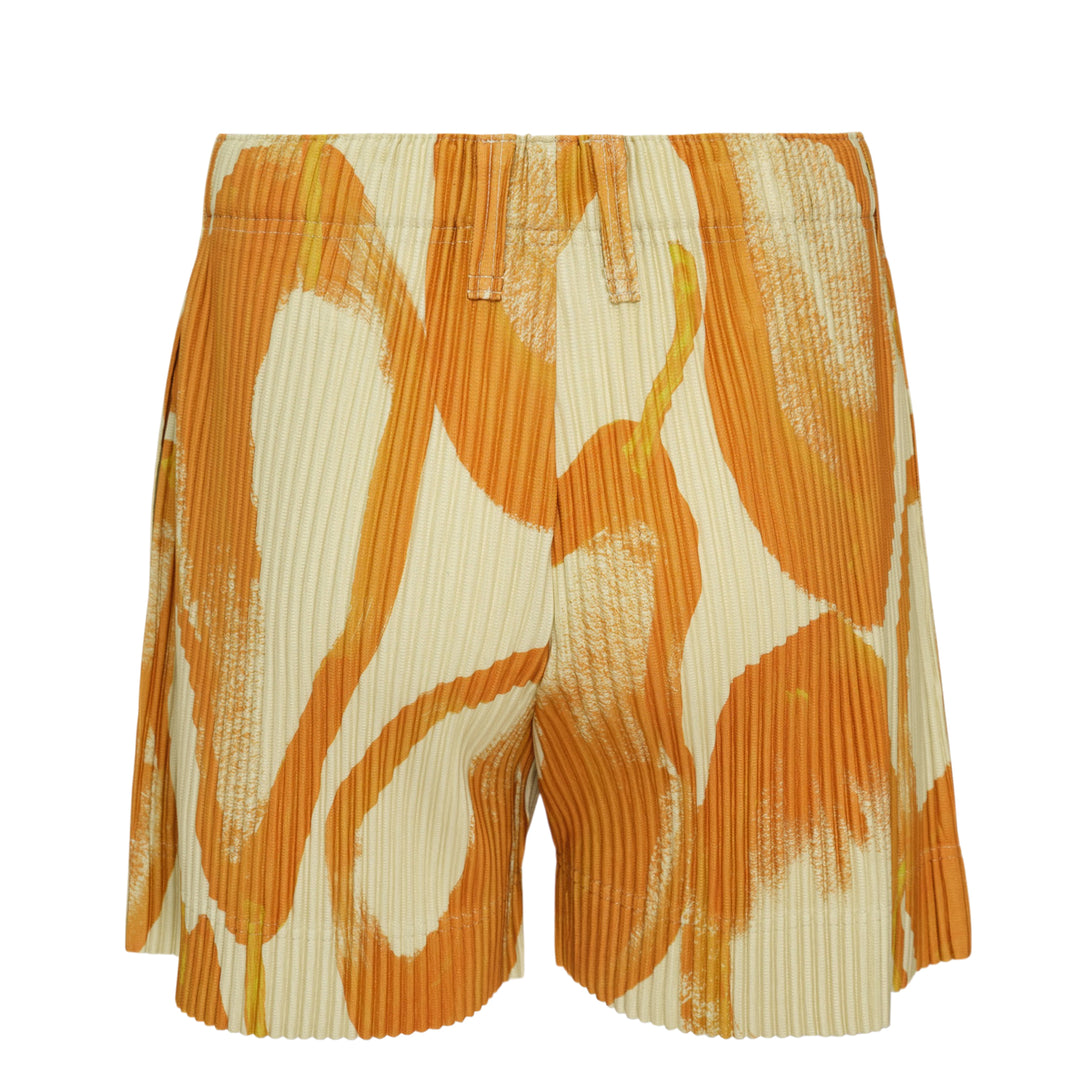 Homme Plissé Issey Miyake Fruits & Vegetables Pleated Shorts in light blue with orange citrus and green leaf all-over print, back view