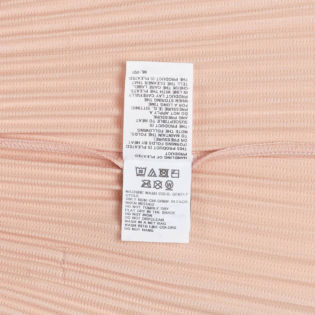 Homme Plissé Issey Miyake Color Pleats Pleated Cardigan in tan brown with full-length zipper and hooded collar, displayed on a white background