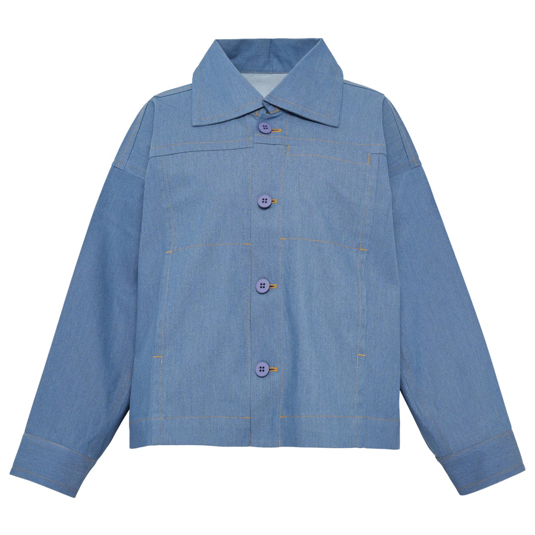 me Issey Miyake Flat Denim Jacket in light blue with purple buttons and contrast gold topstitching, flat lay front view