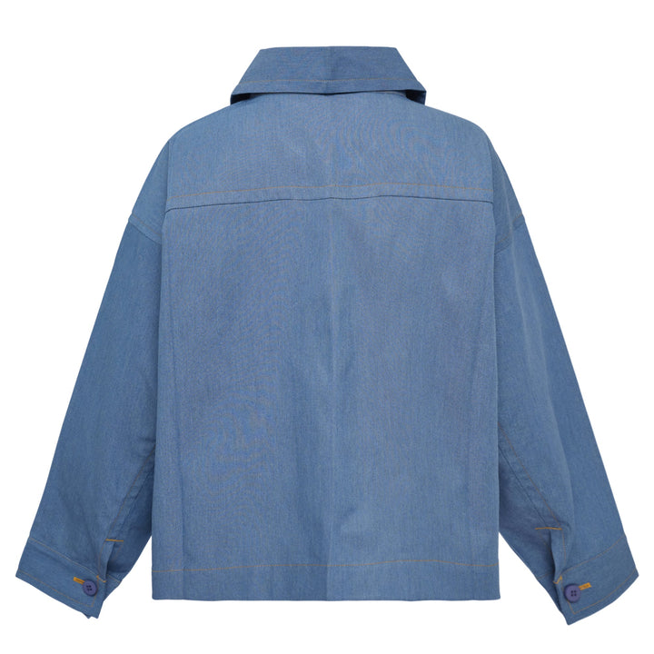 me Issey Miyake Flat Denim Jacket in light blue with purple buttons and contrast gold topstitching, flat lay front view