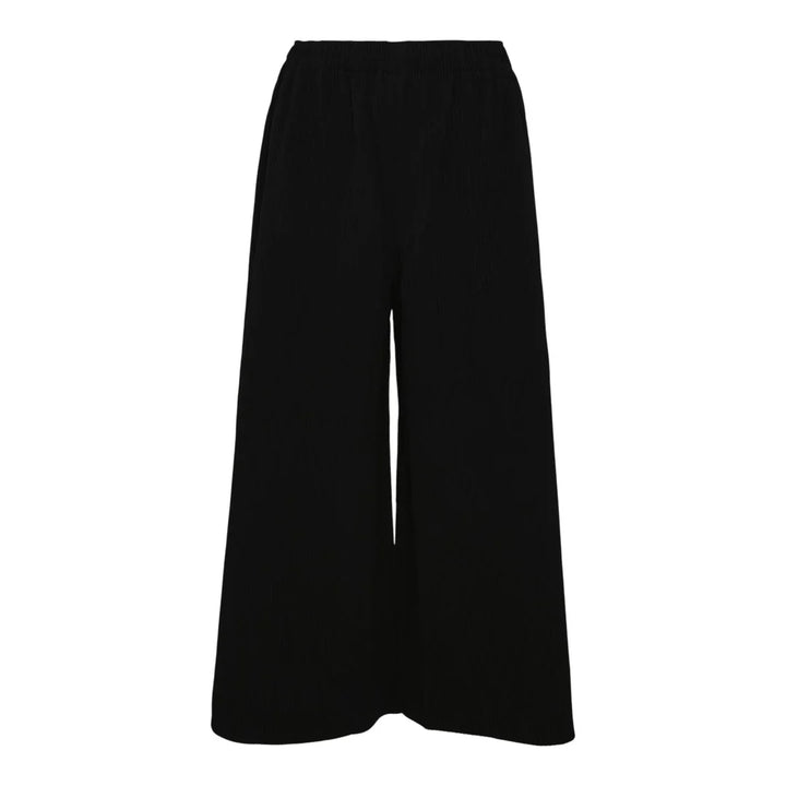 me Issey Miyake Fine Knit Pleated Wide Pants in black with elastic waistband and wide-leg silhouette, front view