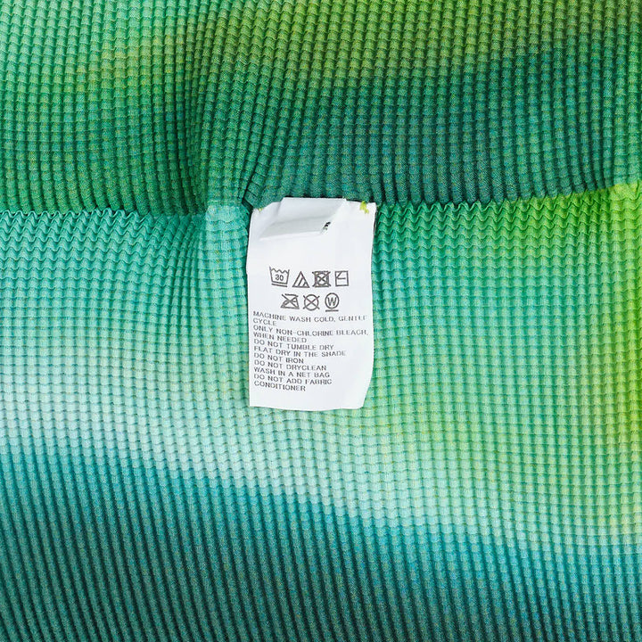 me ISSEY MIYAKE Aurora Long Sleeve Round Neck Top – Available at Club 21, Official Retailer in Singapore, Malaysia & Thailand with Global Shipping Online