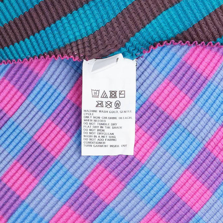 me ISSEY MIYAKE Magic Stripe Top – Available at Club 21, Official Retailer in Singapore, Malaysia & Thailand with Global Shipping Online