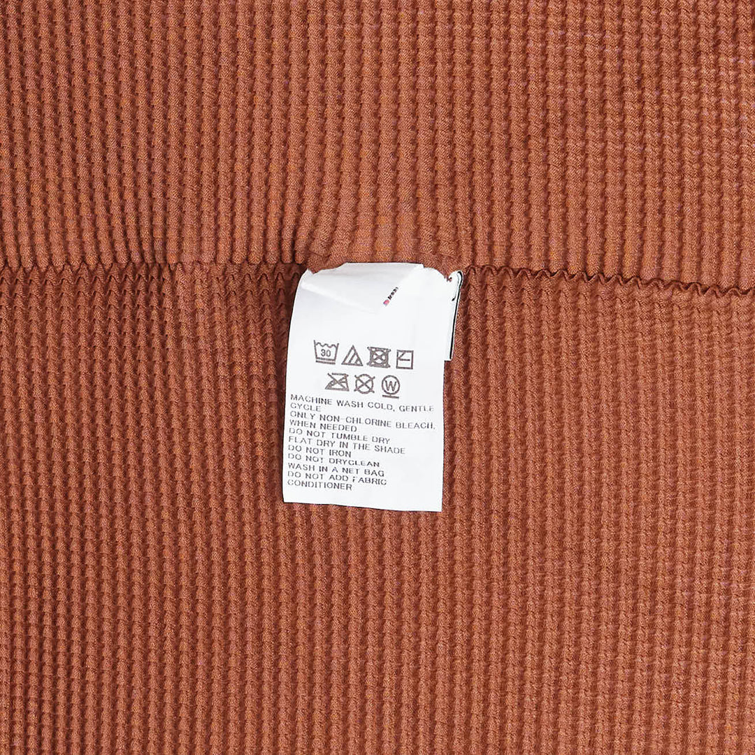 me ISSEY MIYAKE Stretch Pleats Short Sleeve Top – Available at Club 21, Official Retailer in Singapore, Malaysia & Thailand with Global Shipping Online