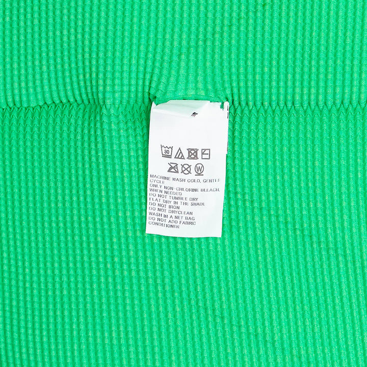 me ISSEY MIYAKE Stretch Pleats Short Sleeve Top – Available at Club 21, Official Retailer in Singapore, Malaysia & Thailand with Global Shipping Online