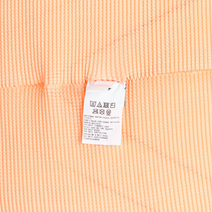 me ISSEY MIYAKE Stretch Pleats Short Sleeve Top – Available at Club 21, Official Retailer in Singapore, Malaysia & Thailand with Global Shipping Online