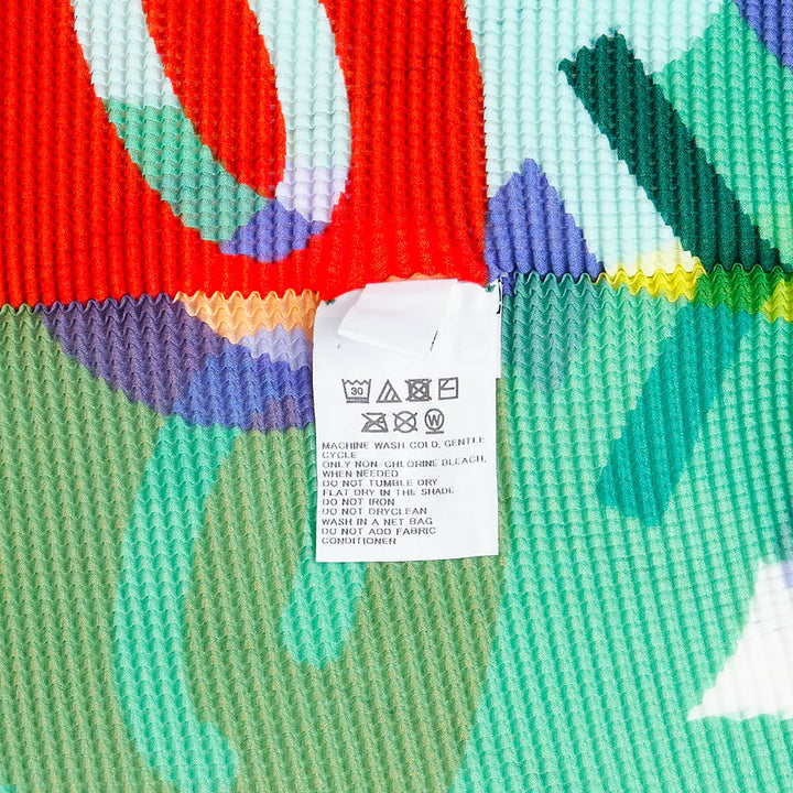 me ISSEY MIYAKE Pleated Short Sleeve Top – Available at Club 21, Official Retailer in Singapore, Malaysia & Thailand with Global Shipping Online