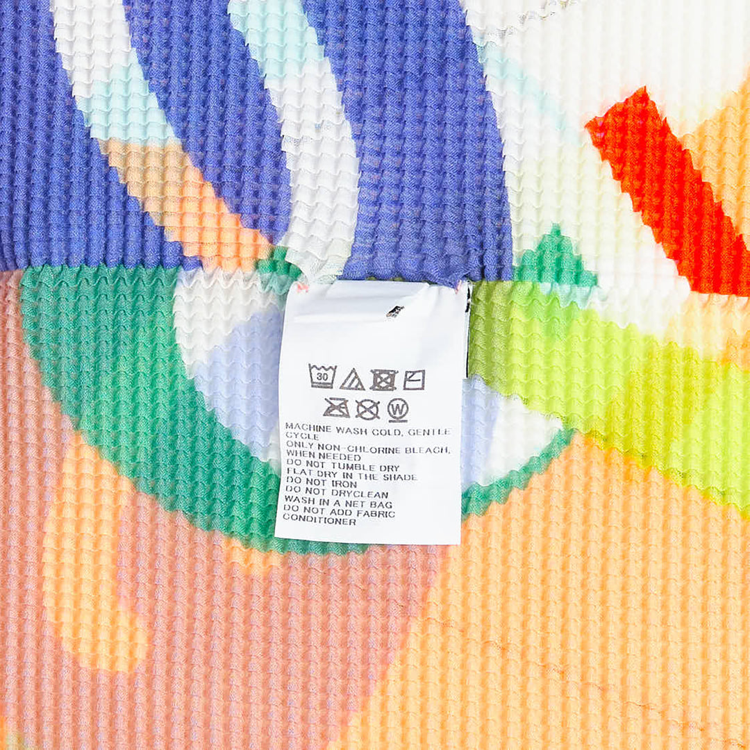me ISSEY MIYAKE Surprise Box Short Sleeve Top – Available at Club 21, Official Retailer in Singapore, Malaysia & Thailand with Global Shipping Online