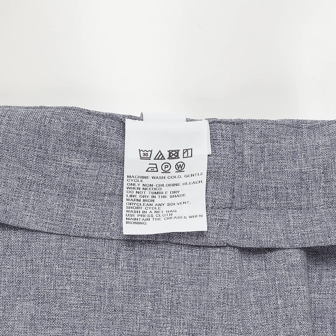 me Issey Miyake Flat Front Culottes Shorts in grey melange, wide-leg silhouette with clean flat waistband, front view on white background