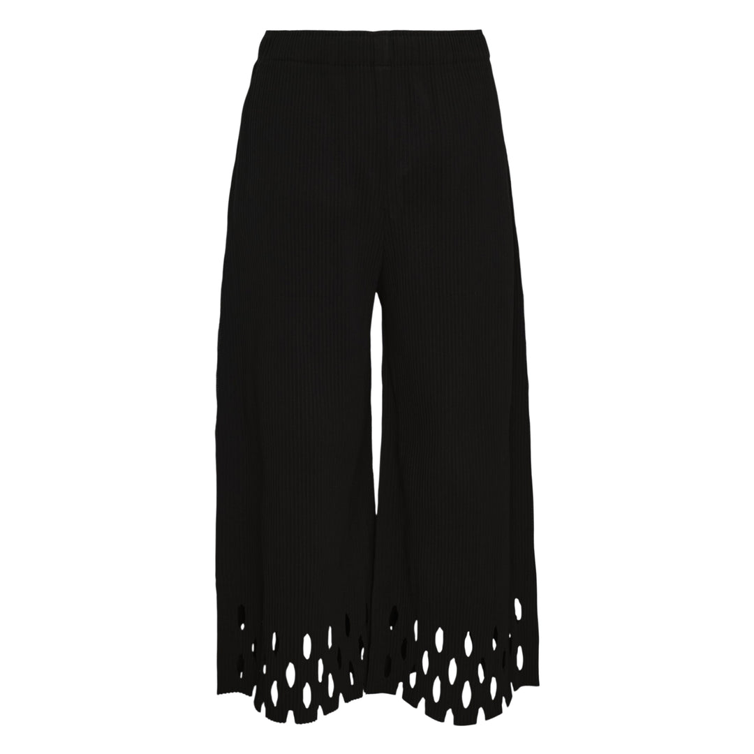 me Issey Miyake Fine Knit Pleats Bottom Pants in black with wide-leg culotte silhouette and decorative cut-out eyelet hem detail