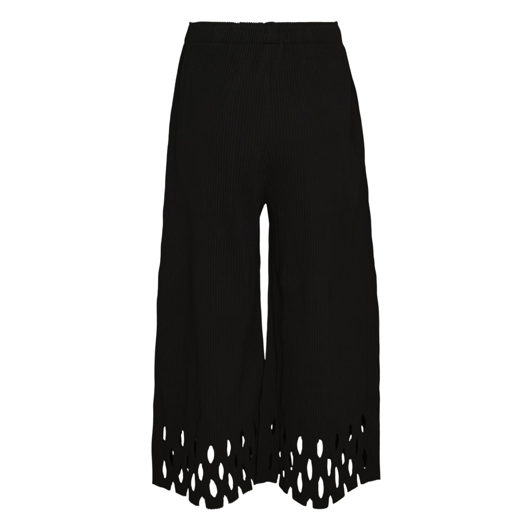 me Issey Miyake Fine Knit Pleats Bottom Pants in black with wide-leg culotte silhouette and decorative cut-out eyelet hem detail