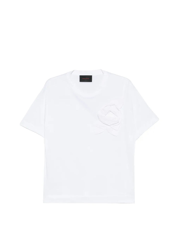 Simone Rocha Pressed Rosette T-Shirt in blush pink with tonal 3D rose appliqué and ribbon detail at chest, flat lay on white background