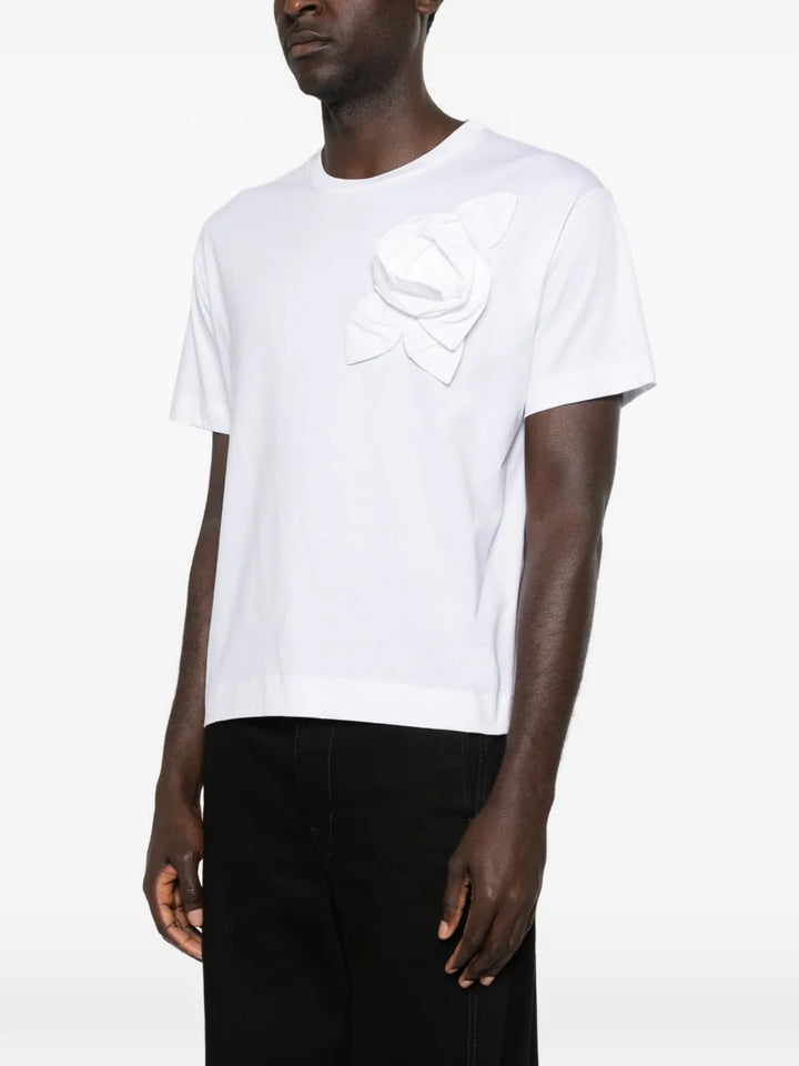 Simone Rocha Pressed Rosette T-Shirt in blush pink with tonal 3D rose appliqué and ribbon detail at chest, flat lay on white background