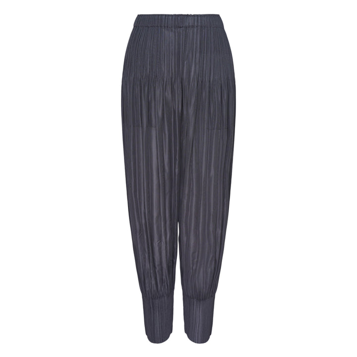Pleats Please Issey Miyake Fluffy Basics Pleated Pants in charcoal grey with vertical pleating, relaxed harem silhouette, elasticated waist and cuffs