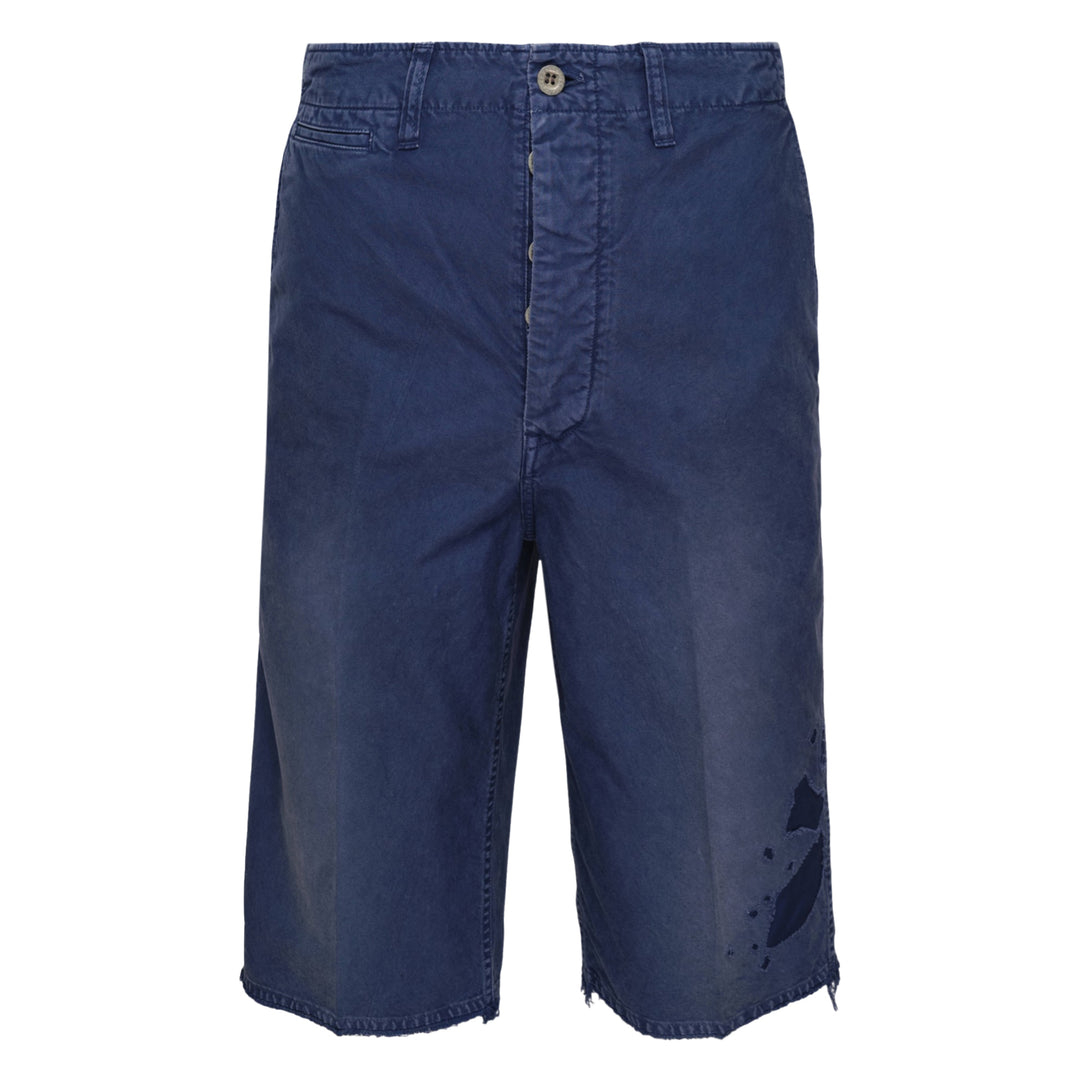 visvim Broader Chino Crash Shorts in washed navy blue with button fly, distressed cut-out detailing, and raw frayed hem
