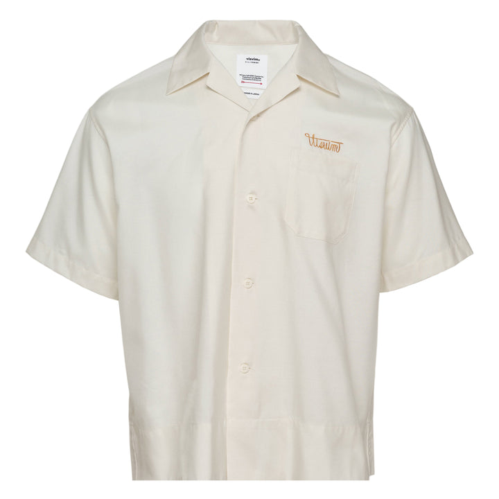 visvim Copa Short Sleeve Silk Shirt in off-white with camp collar, chest pocket, and embroidered script logo