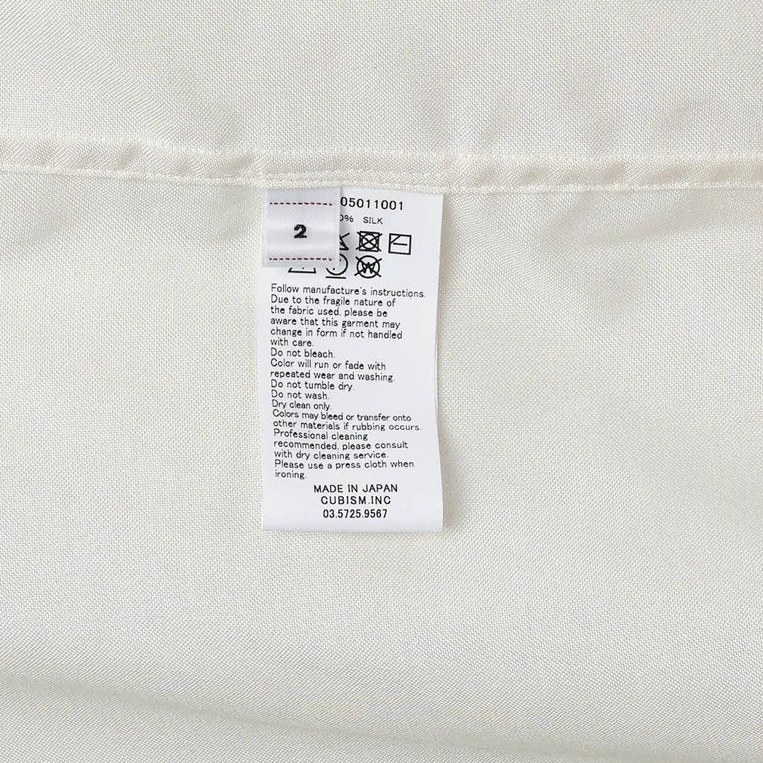visvim Copa Short Sleeve Silk Shirt in off-white with camp collar, chest pocket, and embroidered script logo