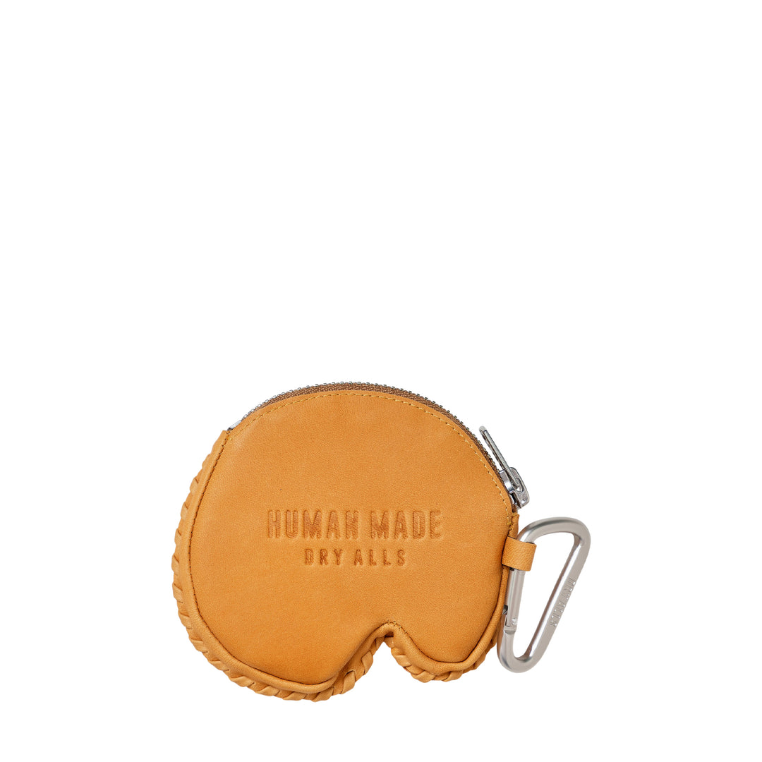 Human Made Baseball Glove Coin Case in tan suede-tone leather with whipstitch edging, zip closure, carabiner clip, and heart logo charm