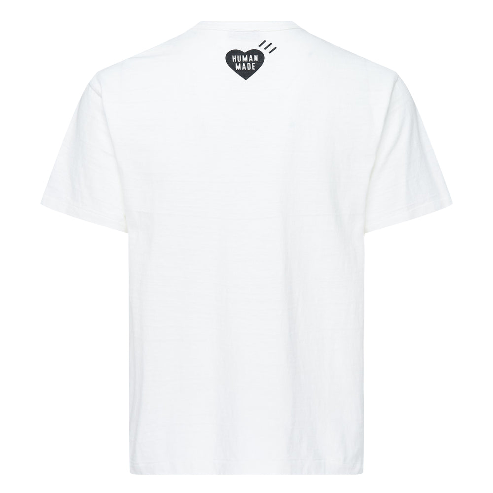 Human Made white short sleeve t-shirt featuring a hand-drawn orange dog illustration with 'Dry Alls' text and arched Human Made branding on the chest