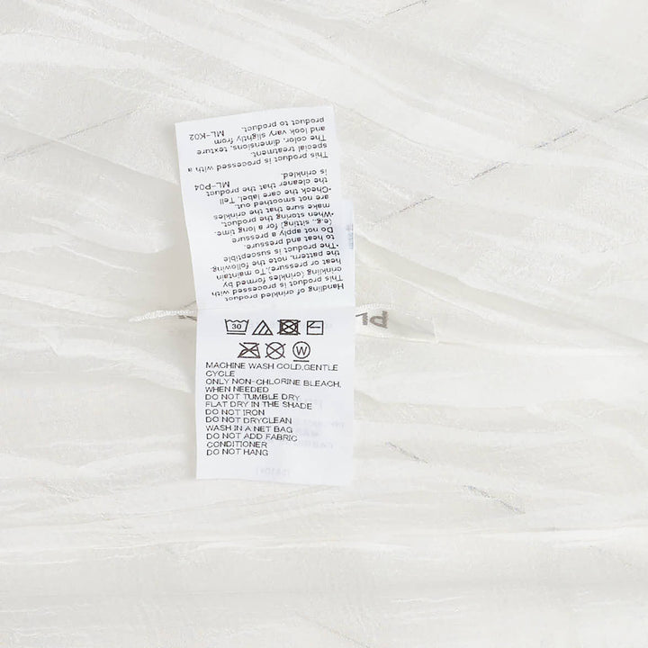 Pleats Please Issey Miyake Twisted Border Shirt in sheer black pleated fabric with horizontal stripe pattern and short sleeves, flat lay front view