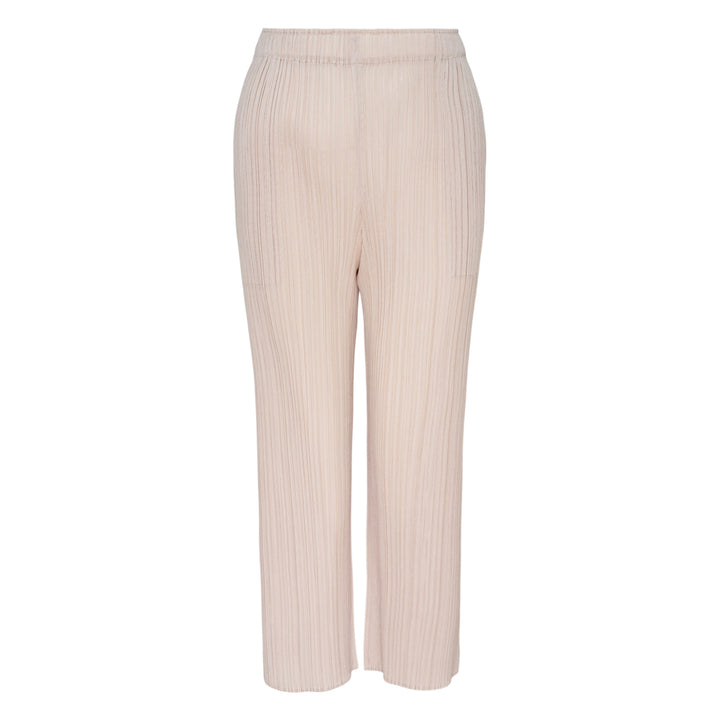 Pleats Please Issey Miyake Monthly Colors May Pants in soft blush pink with vertical micro-pleating and an elasticated waistband, straight-leg silhouette on a white background.