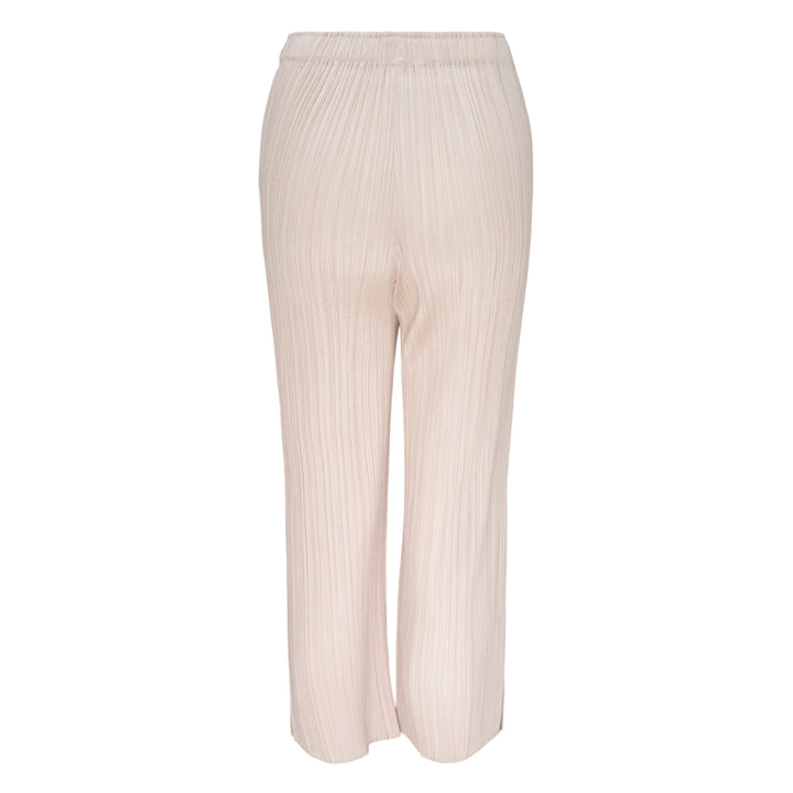 Pleats Please Issey Miyake Monthly Colors May Pants in soft blush pink with vertical micro-pleating and an elasticated waistband, straight-leg silhouette on a white background.