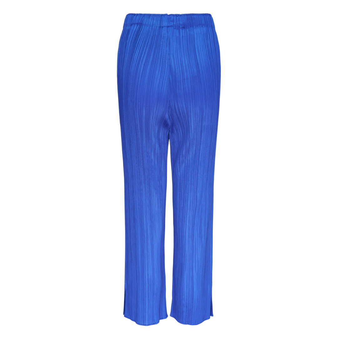 Pleats Please Issey Miyake Monthly Colors May Pants in cobalt blue micro-pleated fabric with elasticated waistband and straight-leg silhouette