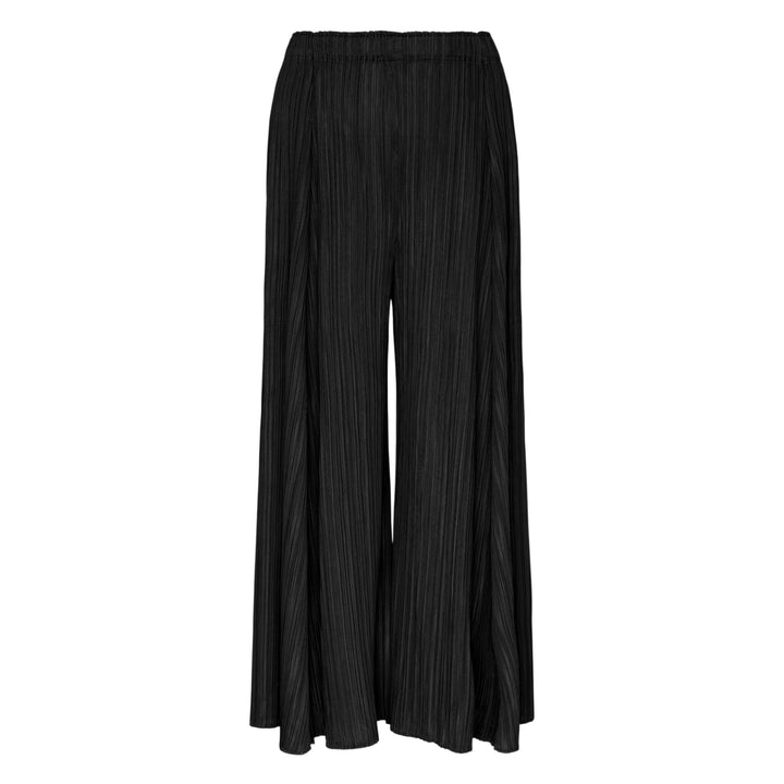 Pleats Please Issey Miyake Mellow Pleats Pants in black, featuring a wide-leg silhouette, fine vertical pleating, and an elasticated waistband, displayed flat on a white background.