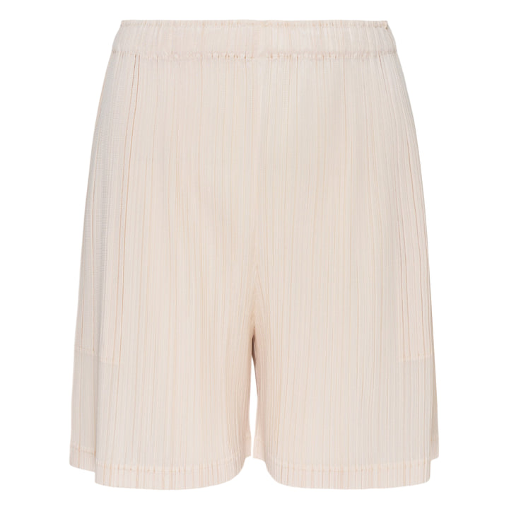 Pleats Please Issey Miyake Loop Pleated Shorts in cream with vertical micro-pleating and elasticated waistband, front view on white background