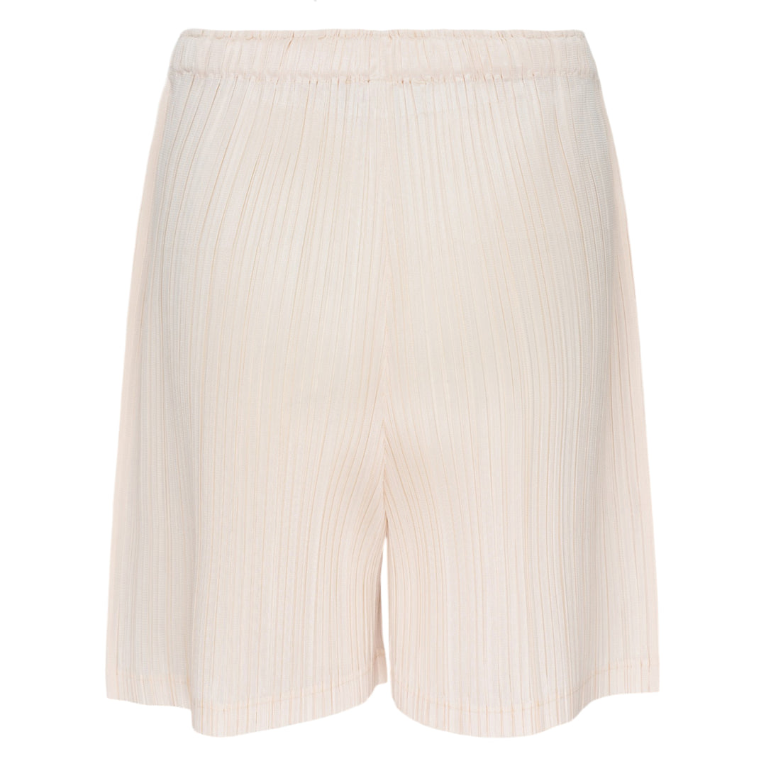 Pleats Please Issey Miyake Loop Pleated Shorts in cream with vertical micro-pleating and elasticated waistband, front view on white background