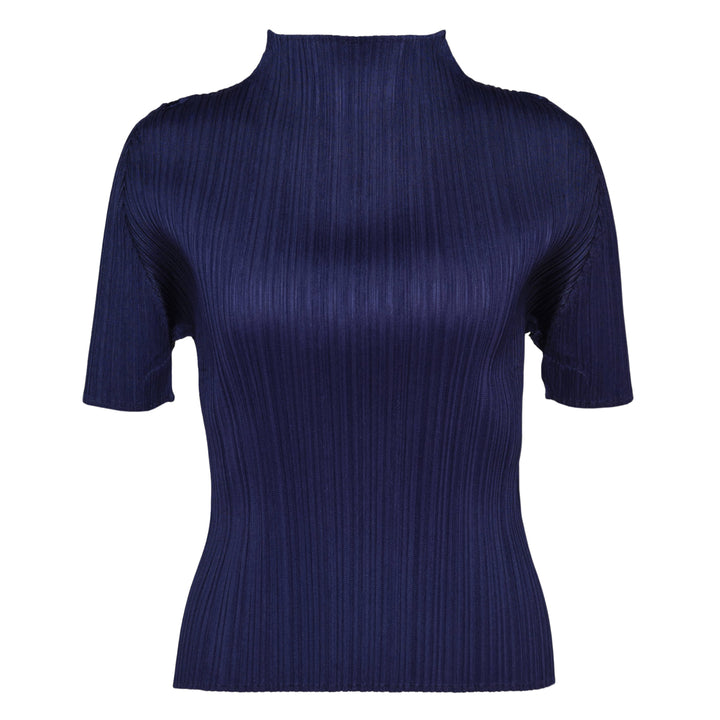 Pleats Please Issey Miyake Monthly Colors May short sleeve mock neck top in blush pink pleated fabric, product flat lay on white background