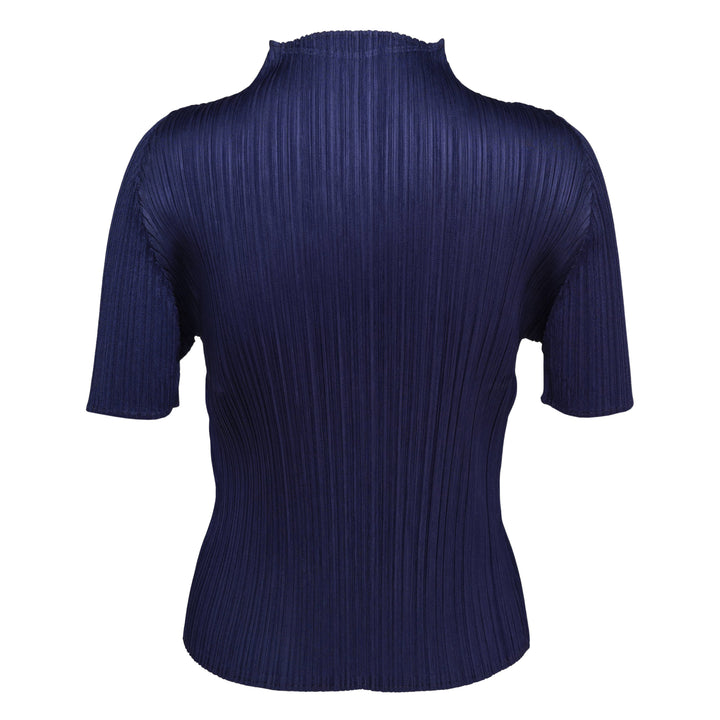 Pleats Please Issey Miyake Monthly Colors May short sleeve mock neck top in blush pink pleated fabric, product flat lay on white background