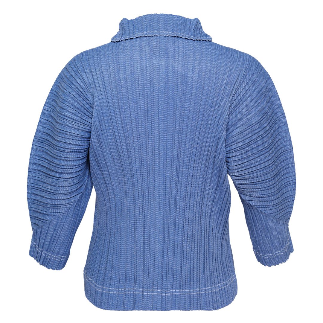 Pleats Please Issey Miyake Cotton Denim pleated top in indigo blue, featuring a notched mock neck, elbow-length sleeves, all-over vertical pleating, and contrast hem stitching — front view on white background