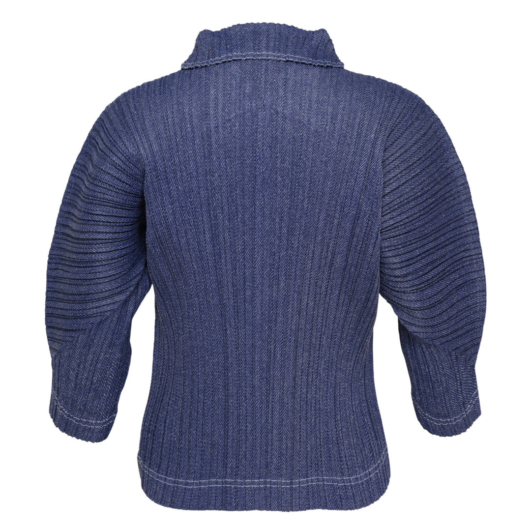 Pleats Please Issey Miyake Cotton Denim pleated top in indigo blue, featuring a notched mock neck, elbow-length sleeves, all-over vertical pleating, and contrast hem stitching — front view on white background
