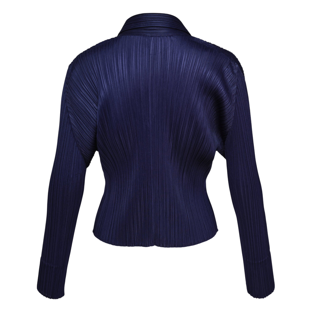 Pleats Please Issey Miyake Monthly Colors May Cardigan in blush pink with micro-pleated fabric, wide lapel collar and tonal button-front closure