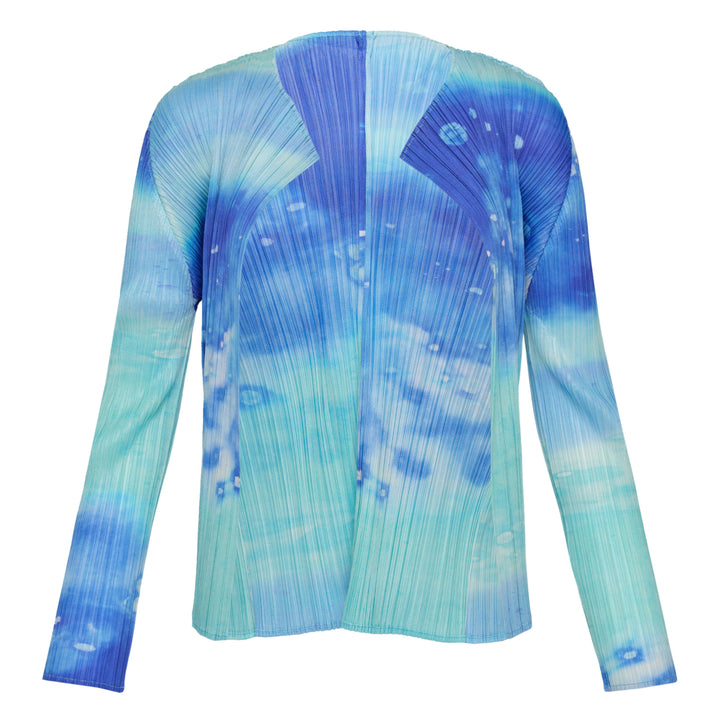 Back view of Pleats Please Issey Miyake Sea Bubble Cardigan in micro-pleated fabric with an aqua, cobalt and periwinkle blue watercolour ocean print