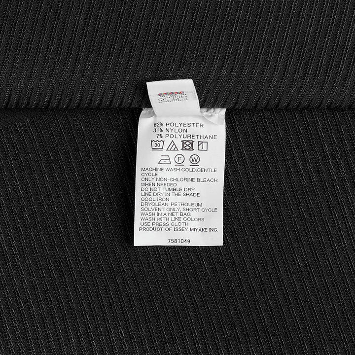 Pleats Please Issey Miyake A-POC Sea Glass Shirt in black ribbed pleated knit with asymmetric hem and oversized silhouette